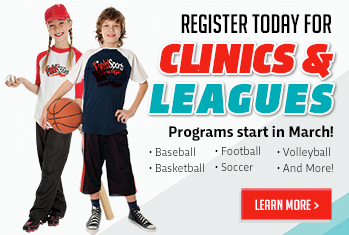 Happy kids with balloons smiling at the camera.